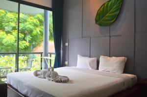 Postel nebo postele na pokoji v ubytování Z&Z Resort + 74 fotografií