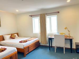 Ένα ή περισσότερα κρεβάτια σε δωμάτιο στο Trendy Hotel