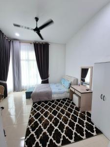 Postel nebo postele na pokoji v ubytování Mr Cook Homestay Melor + 25 fotografií