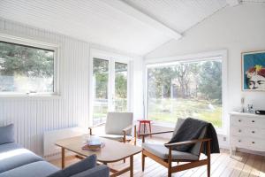 a living room with a couch and a table at 11120-1-Nykobing-Sj-Birkehaekken-9 in Nykøbing Sjælland