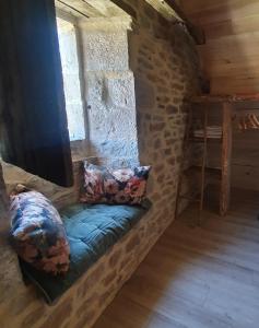 Ένα ή περισσότερα κρεβάτια σε δωμάτιο στο La Maison du Garde