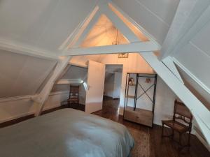 Ένα ή περισσότερα κρεβάτια σε δωμάτιο στο Het Boerengenieten