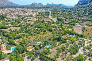 an aerial view of a town with mountains at Villa Rafaleta by Villa Plus in Pollença