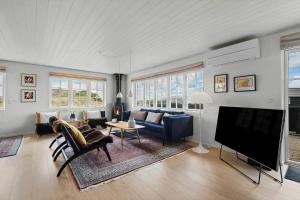 Un televizor și/sau centru de divertisment la FAN005-Fano-Hympelvej-49