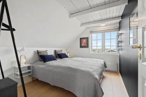 Un pat sau paturi într-o cameră la FAN005-Fano-Hympelvej-49