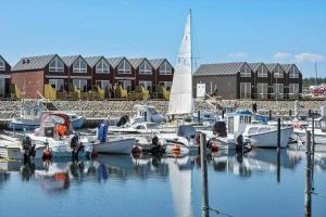 a group of boats docked in a marina at 8592-Glesborg-Muslingevej-9 in Glesborg