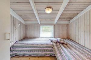 Postel nebo postele na pokoji v ubytování 8910-Glesborg-Triersvej-34