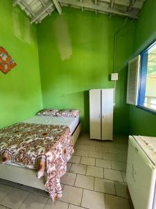 Postel nebo postele na pokoji v ubytování Pousada Brisa do Mar + 11 fotografií