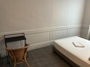 Postel nebo postele na pokoji v ubytování Grand 2 pièces proche quai de l'Isère