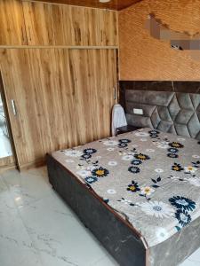 En eller flere senge i et værelse på Solan Vista