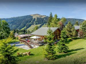 an aerial view of a log house in the mountains at Chalet Joux Verte - OVO Network in Les Gets