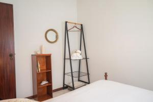 Postel nebo postele na pokoji v ubytování Memórias