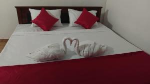 En eller flere senge i et værelse på The Writer's Cottage