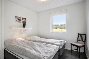 Ένα ή περισσότερα κρεβάτια σε δωμάτιο στο BL106-Saltum-Tolhoj-2