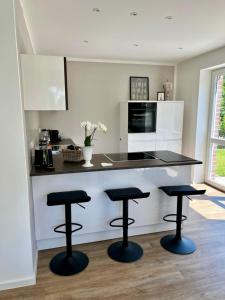 Köök või kööginurk majutusasutuses Wohnträume Große DHH aus 2024 - 160 m2- bis 7 Personen - 2 Bäder