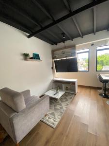 Χώρος καθιστικού στο Confortable apartamento para 4