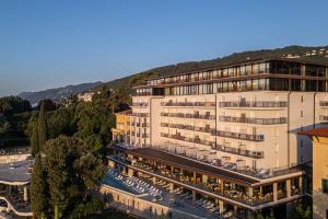 an aerial view of a hotel with a mountain in the background at Amadria Park Grand Hotel 4 Opatijska Cvijeta in Opatija