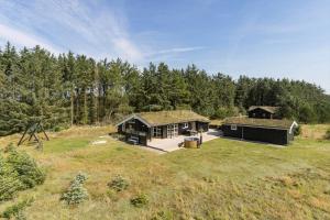an aerial view of a house in the middle of a field at BL1399-Saltum-Laustvej-30 in Saltum