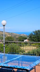 a swimming pool with a view of the ocean at Villa MELANY Casa Vacanza in Piedimonte Etneo