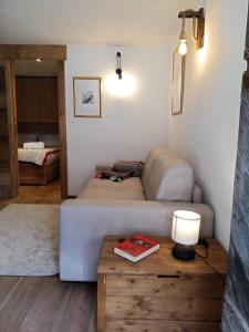 Ένα ή περισσότερα κρεβάτια σε δωμάτιο στο Master Suite a Courmayeur
