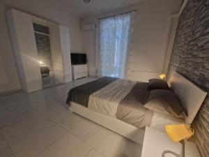 Ένα ή περισσότερα κρεβάτια σε δωμάτιο στο Casa De Pinedo