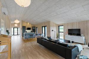 Μια τηλεόραση ή/και κέντρο ψυχαγωγίας στο BL1557-Saltum-Tolhoj-52