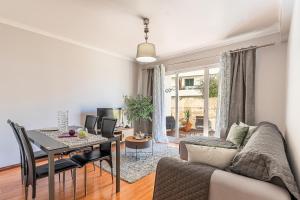 Χώρος καθιστικού στο Cozy Stay