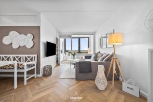 TV a/nebo společenská místnost v ubytování Ferienwohnung Küstenzauber 7603 Marina Wendtorf