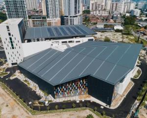 an overhead view of a building with a blue roof at Arena Suites Kuala Lumpur in Kuala Lumpur