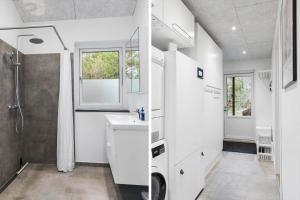 Un baño blanco con lavabo y ducha. en BL1266-Pandrup-Rodhusparken-58, en Pandrup 26 fotos más
