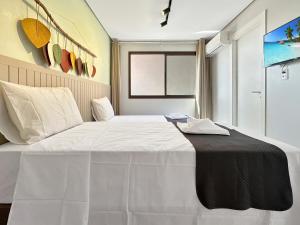 Postel nebo postele na pokoji v ubytování Condomínio Clube Luxo Marina Privativa 5 Suítes