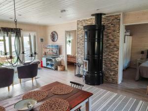 Posezení v ubytování Holiday Home Kivilahti vuokatti by Interhome