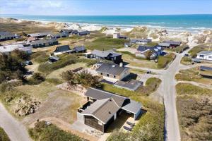 an aerial view of a house on the beach at BL1729-Blokhus-Jens-Baerentsvej-36 in Blokhus