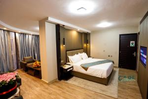 Ένα ή περισσότερα κρεβάτια σε δωμάτιο στο Cape Hotel +13 φωτογραφίες