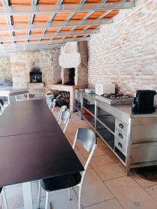 Kuchyň nebo kuchyňský kout v ubytování Casa do Regedor