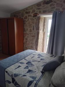 Postel nebo postele na pokoji v ubytování Casa do Regedor + 19 fotografií