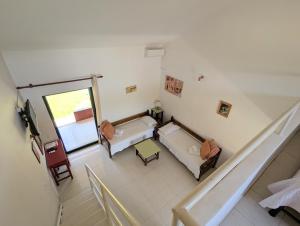 Ένα ή περισσότερα κρεβάτια σε δωμάτιο στο LEFKES Apartments Sidari