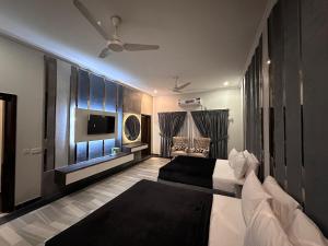 Ένα ή περισσότερα κρεβάτια σε δωμάτιο στο Hyatt Residency