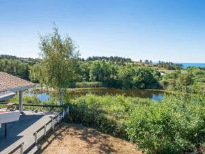 a view of a river from a house at Lakeview Hideaway - By Traum Ferienwohnungen in Ørby