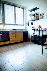 a kitchen with a sink and a counter top at Momy's Home Rome in Rome