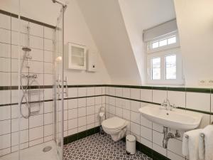 Koupelna v ubytování Jugendstilhaus Markplatz + 25 fotografií