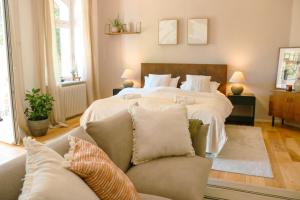 Ένα ή περισσότερα κρεβάτια σε δωμάτιο στο Big-size Bett Gartenapartment +4 φωτογραφίες