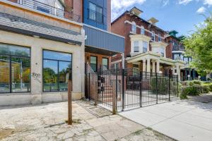 a wrought iron gate in front of a building at Penthouse Condo with Rooftop Deck in Philadelphia! in Philadelphia