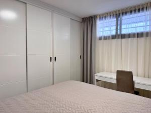 Ένα ή περισσότερα κρεβάτια σε δωμάτιο στο Nice Apartment in Los Cristianos +12 φωτογραφίες