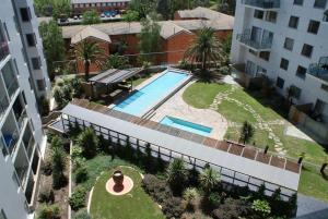 an overhead view of a swimming pool in a building at City Centre Apartment 17 in Turner