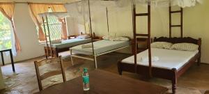 Ένα ή περισσότερα κρεβάτια σε δωμάτιο στο PRIMESHADE GUESTHOUSE +21 φωτογραφίες