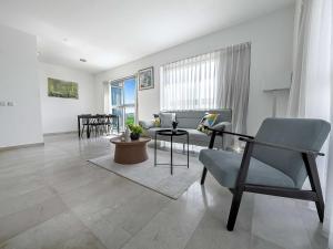 Χώρος καθιστικού στο Shoreline Urban Suite +15 φωτογραφίες