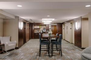 a conference room with a table and chairs at River Hotel in Chicago