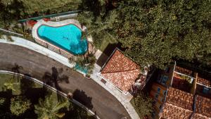an overhead view of a swimming pool in a building at Landing View 203 with private rooftop terrace in Rincon
