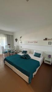 Ένα ή περισσότερα κρεβάτια σε δωμάτιο στο Domina Coral Bay la casa di Chloe sharm el sheikh